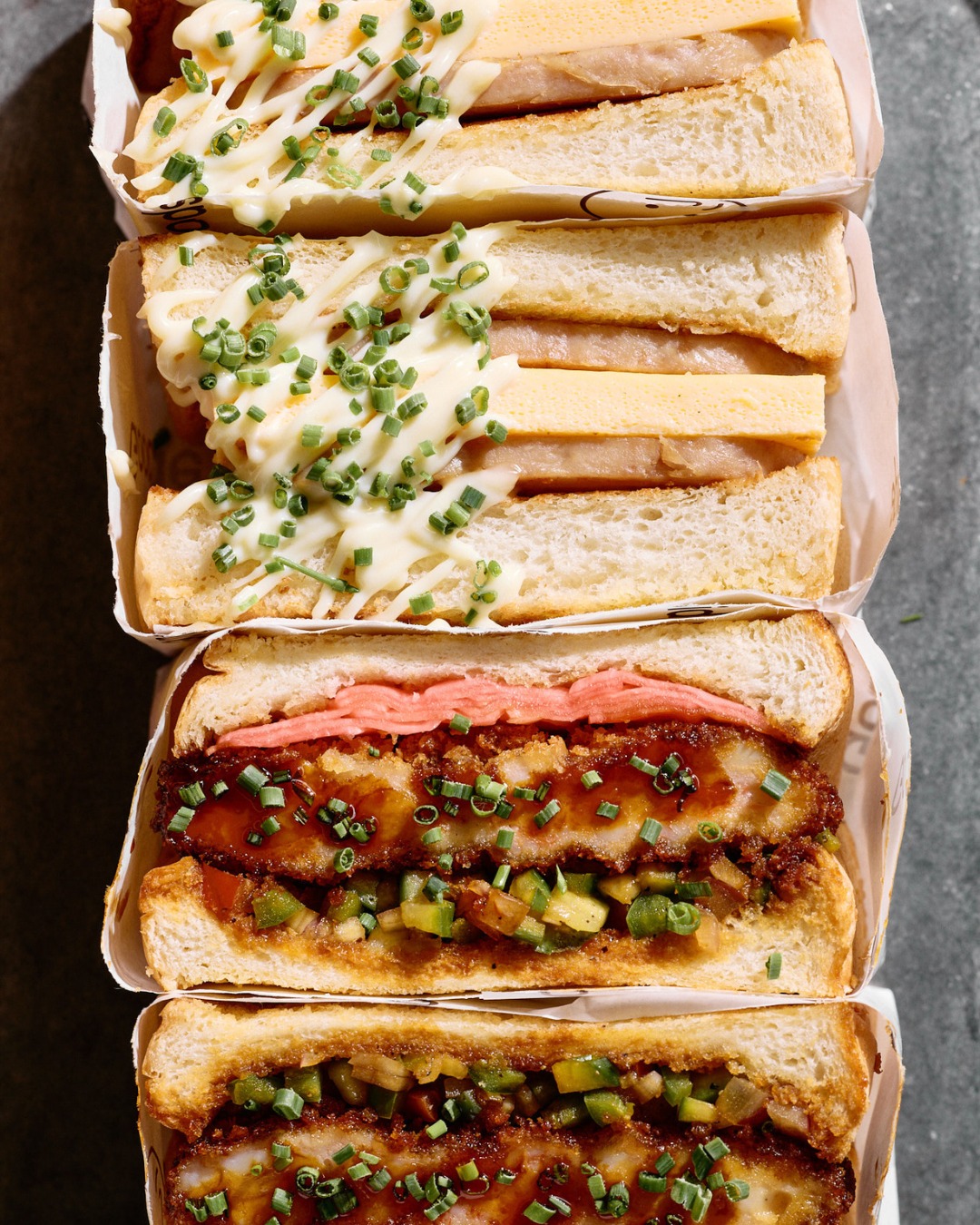A row of Goodside sandos, including the prawn har gow katsu sando